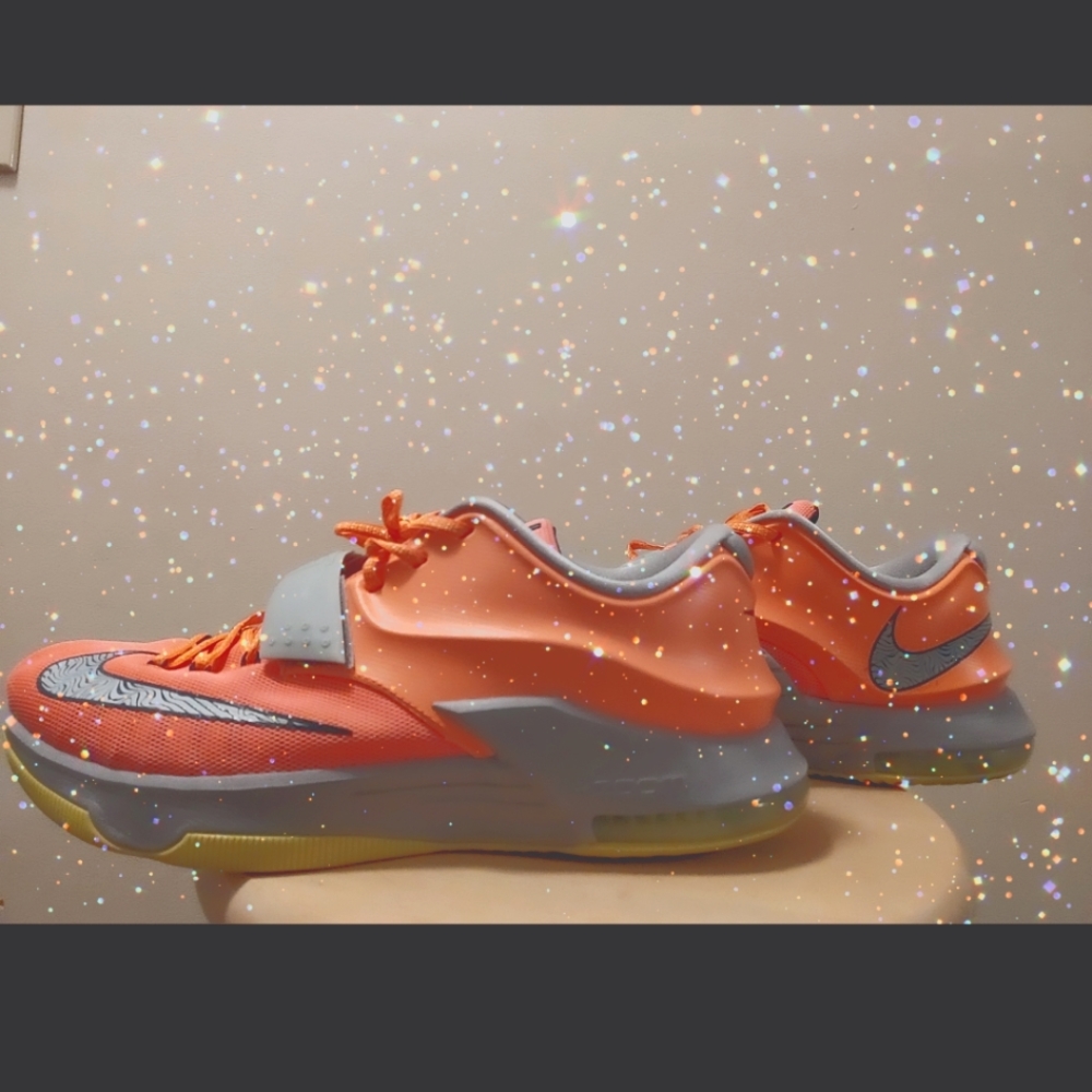 Pair of men's size 12 (Peach&Gray)Nike Kevin Durant 7s in Really Good Condition.